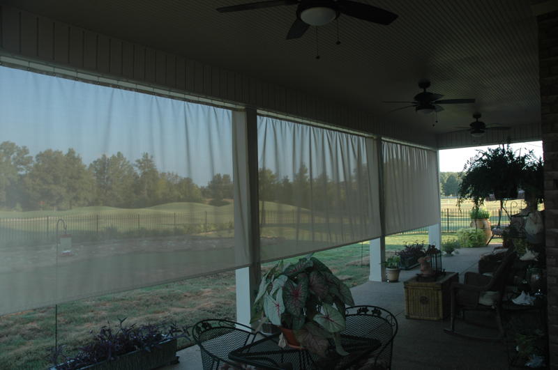 Outdoor curtains on covered patio