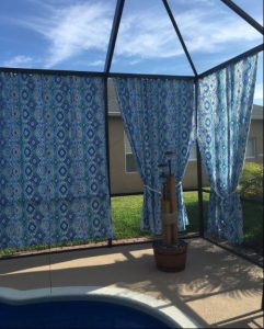 Outdoor curtains around pool